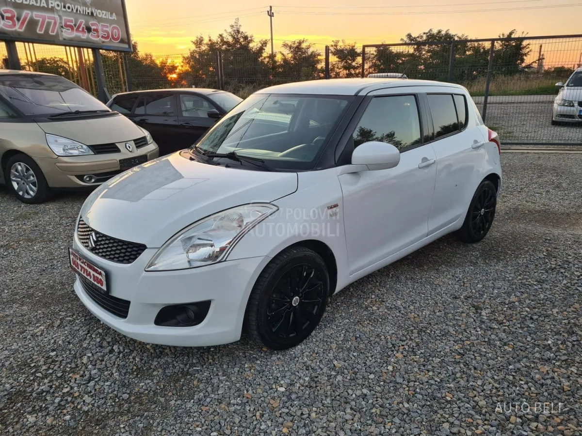 Suzuki Swift 1.3 ddis (2012) - slika 4