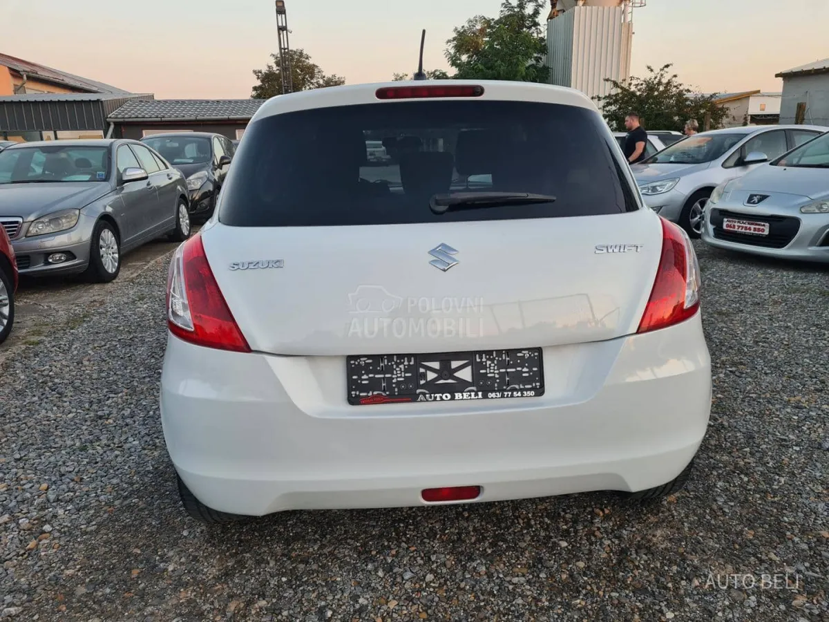 Suzuki Swift 1.3 ddis (2012) - slika 11