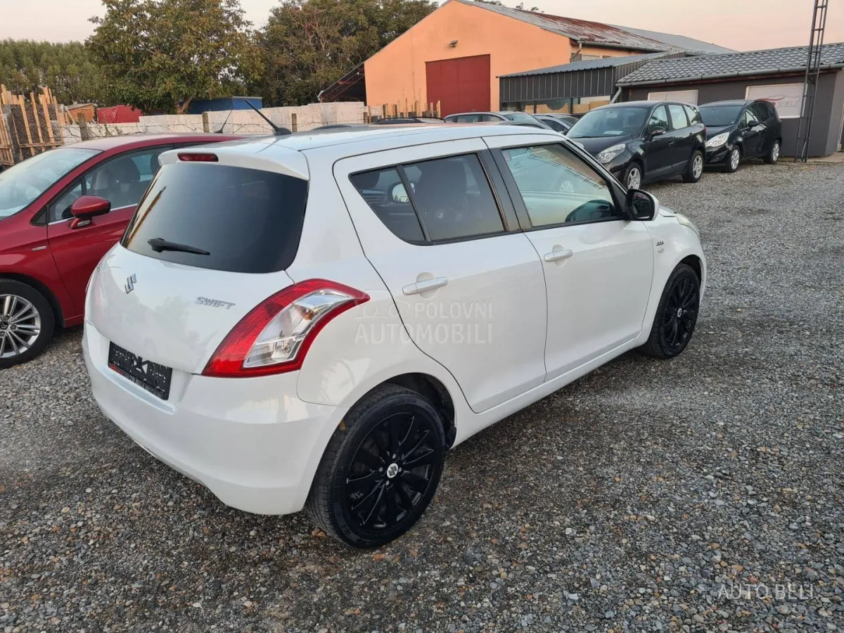 Suzuki Swift 1.3 ddis (2012) - slika 6