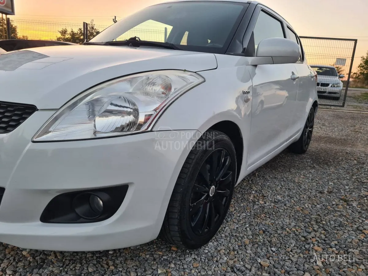 Suzuki Swift 1.3 ddis (2012) - slika 8