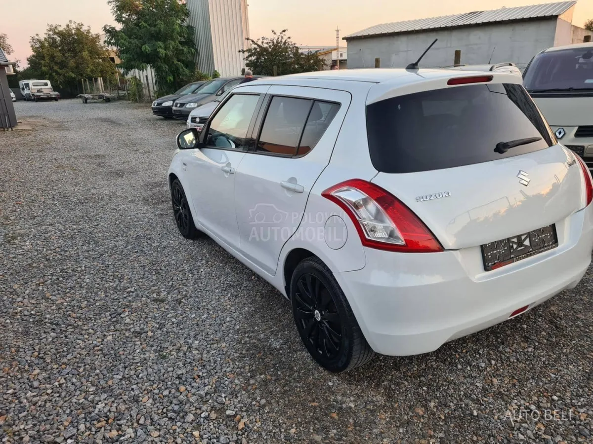 Suzuki Swift 1.3 ddis (2012) - slika 10